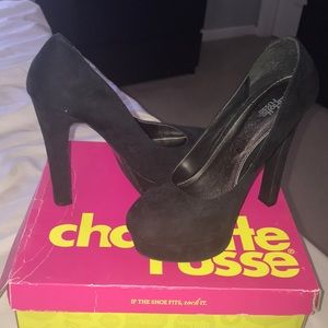 Black platform pumps